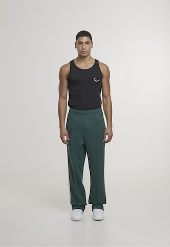 Loosefit Pantaloni di Karl Kani in verde
