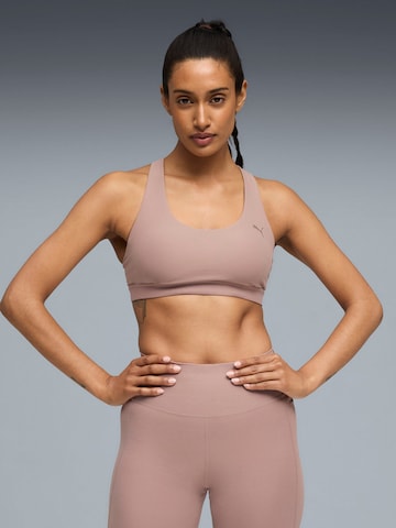Top sportivo 'Puma Cloudspun Bra - Mid' di PUMA in lilla