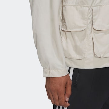 ADIDAS ORIGINALS Übergangsjacke in Beige