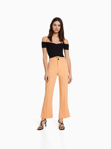 Bershka Flared Broek in Oranje