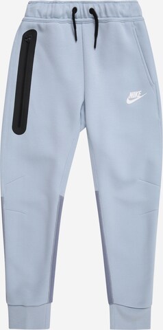 Tapered Pantaloni 'TECH FLC' de la Nike Sportswear pe albastru: față
