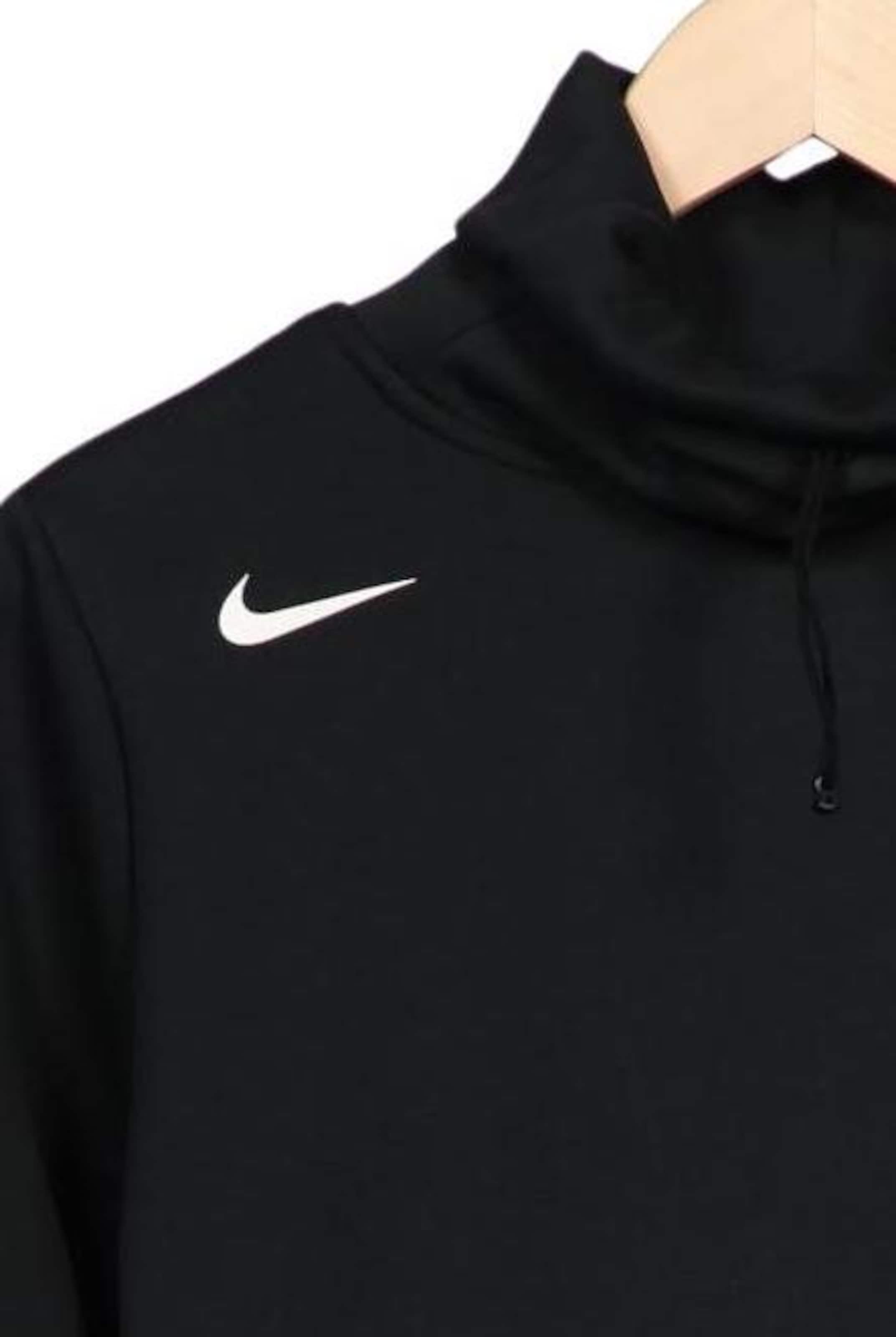 NIKE Sweater M in Schwarz
