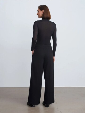 Wide leg Pantaloni di Dilvin in nero