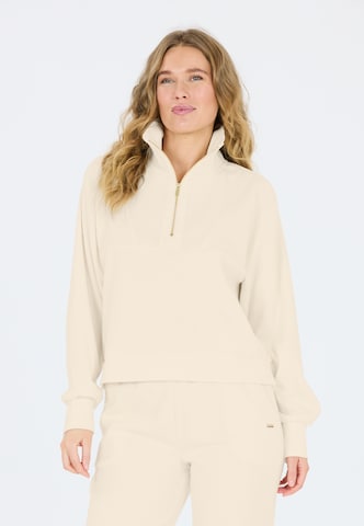 Athlecia Sports sweatshirt in Beige: front