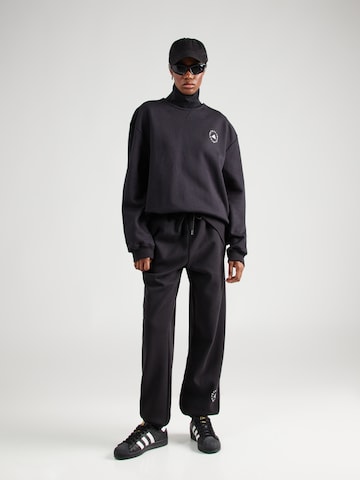 ADIDAS BY STELLA MCCARTNEY Tapered Sports trousers in Black