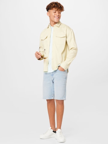 ABOUT YOU x Alvaro Soler Regular fit Button Up Shirt 'Gino' in Beige