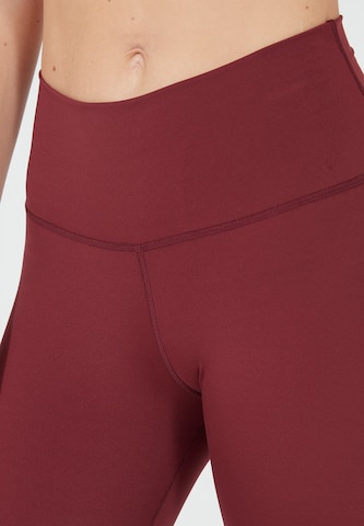 Athlecia Slim fit Workout Pants 'Franz' in Red