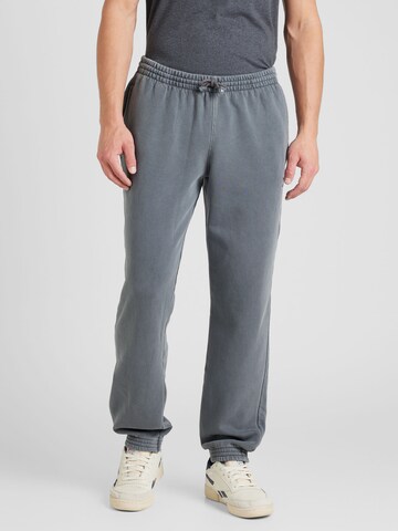 Tapered Pantaloni sportivi di Reebok in grigio: frontale