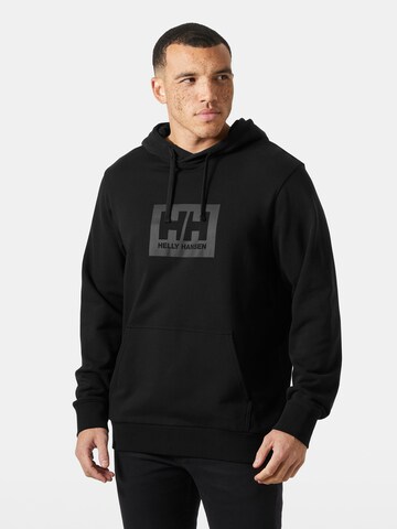 HELLY HANSEN Collegepaita värissä musta: etupuoli