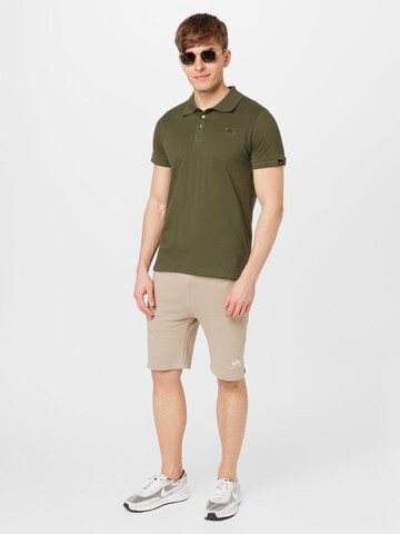 regular Pantaloni di ALPHA INDUSTRIES in beige