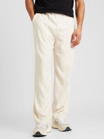 GCDS Regular Pants in White: front