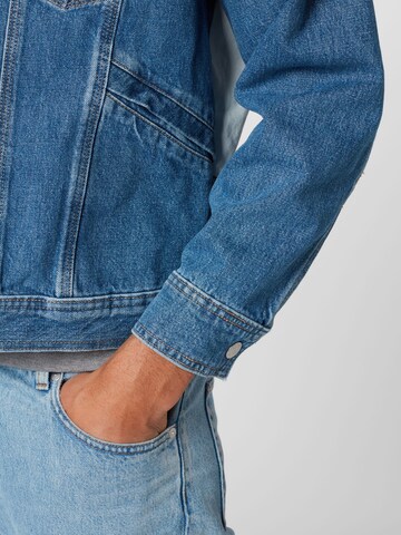 Tommy Jeans Jacke in Blau