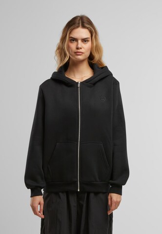 Veste de survêtement 'Peace' Miss Tee en noir : devant