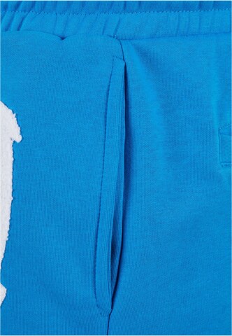 Loosefit Pantalon Karl Kani en bleu
