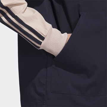 mėlyna ADIDAS ORIGINALS Demisezoninė striukė 'Sst '