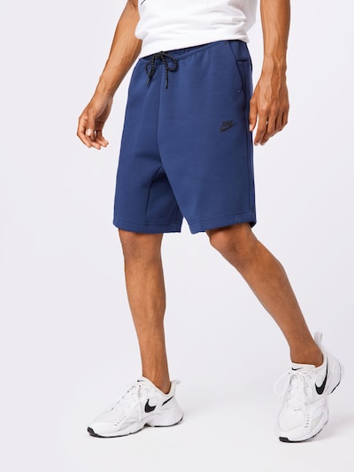 Nike Sportswear Kalhoty - marine modrá / černá, Model/ka