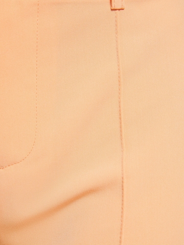 Flared Pantaloni di Bershka in arancione