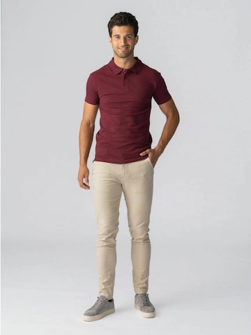 Coupe regular Chemise ' Muscle Polo ' TEESHOPPEN en rouge