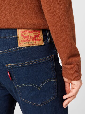 LEVI'S ® Tapered Jeans '502 Taper Hi Ball' i blå