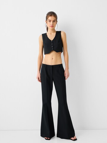 évasé Pantalon à plis Bershka en noir