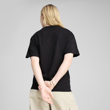 PUMA Shirt 'Graphics Fruity' in Zwart