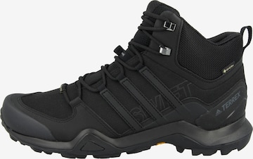 ADIDAS PERFORMANCE Boots 'Swift R2' in Black: front