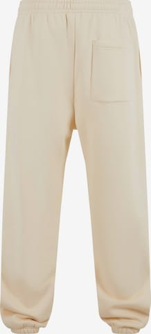 Pantalon Urban Classics en beige : devant