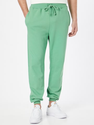 ABOUT YOU Limited Loose fit Pants 'Marlon' in Green: front