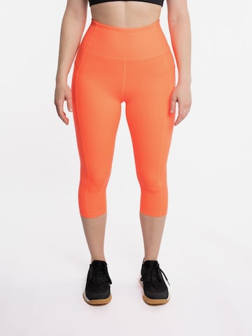 mymotus Skinny Sports trousers 'mymotus®, ladies tight 3/4 length, coral , RW51' in Orange: front
