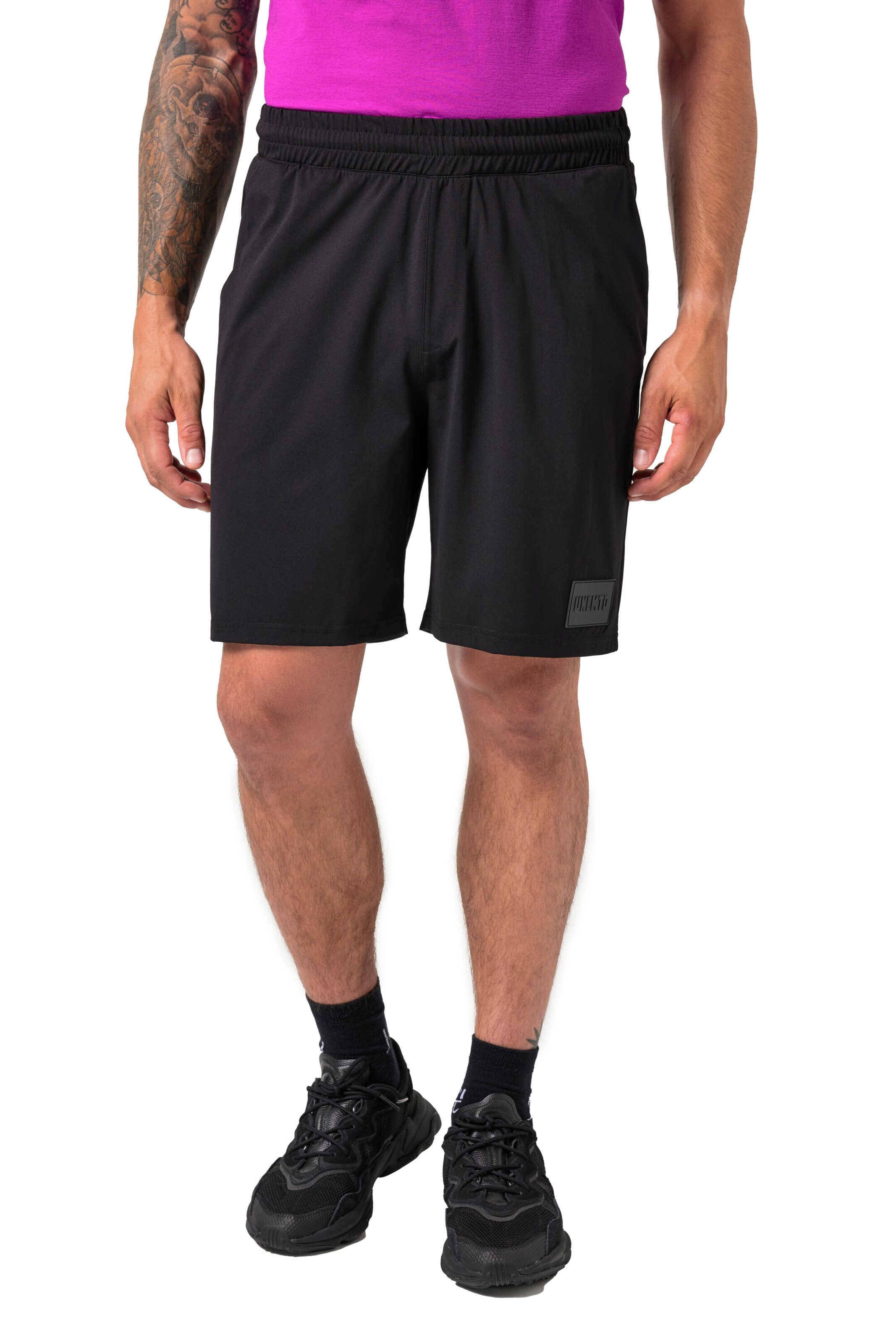 JAY-PI Regular Trousers in Black: front