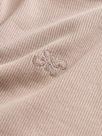 bēšs Next Topiņš