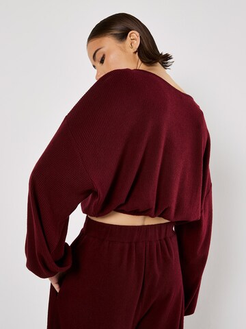 Haut ' ' Apricot en rouge
