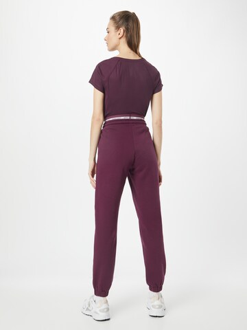 BJÖRN BORG Tapered Sports trousers in Purple