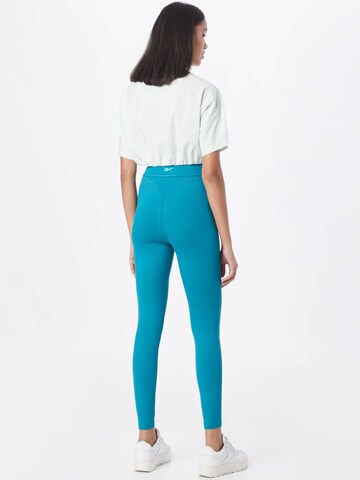 Skinny Pantaloni sportivi di Reebok in blu