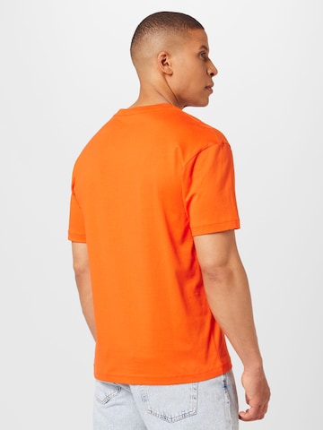 Calvin Klein - Camisa 'Hero' em laranja