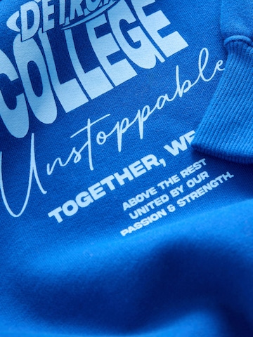 Next Collegepaita värissä sininen