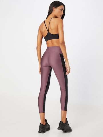 Skinny Pantalon de sport UNDER ARMOUR en violet