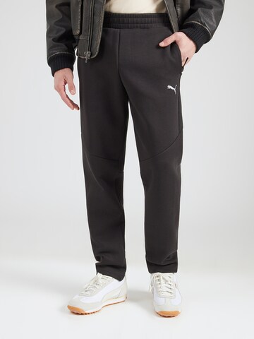 PUMA Regularen Športne hlače 'Evostripe' | črna barva: sprednja stran