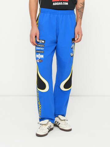 ADIDAS ORIGINALS - Loosefit Pantalón 'Teamgeist' en azul: frente