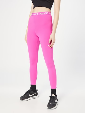 NIKE Skinny Sports trousers in Pink: front