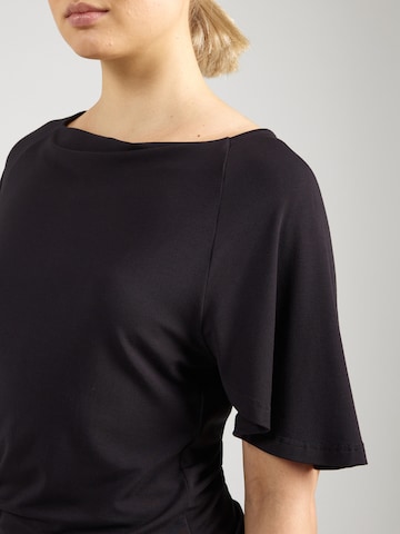 Maglia funzionale di CURARE Yogawear in nero