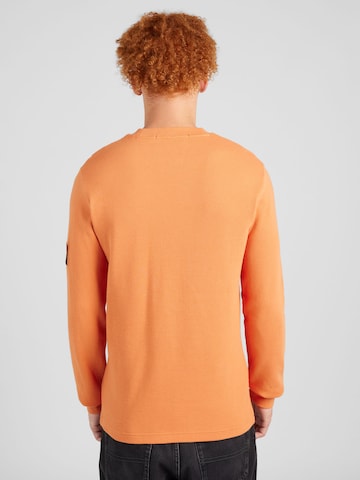 Tricou de la Calvin Klein Jeans pe portocaliu