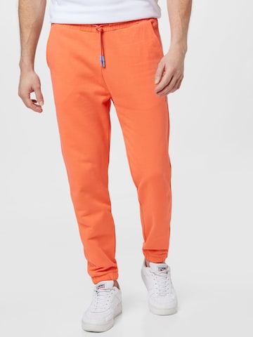 SCOTCH & SODA Tapered Pants in Orange: front