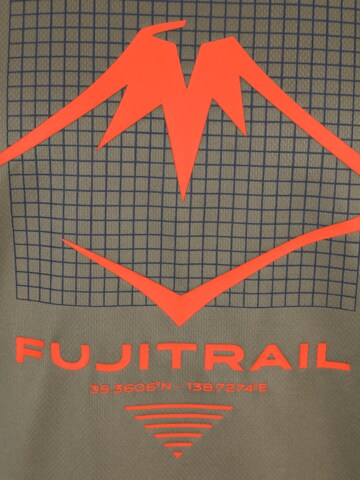 ASICS Toiminnallinen paita 'Fujitrail' värissä vihreä