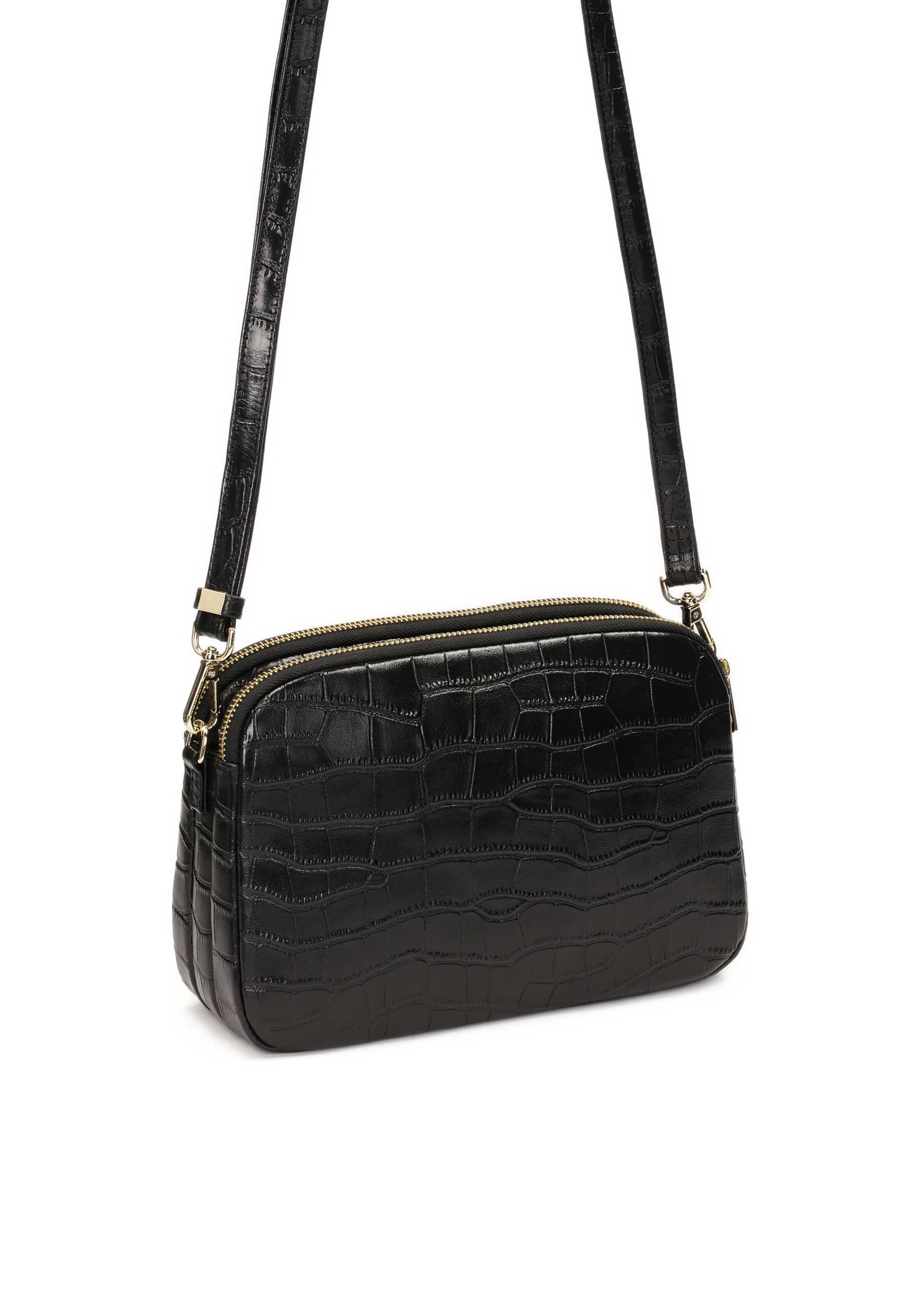 melns Kazar Pleca soma