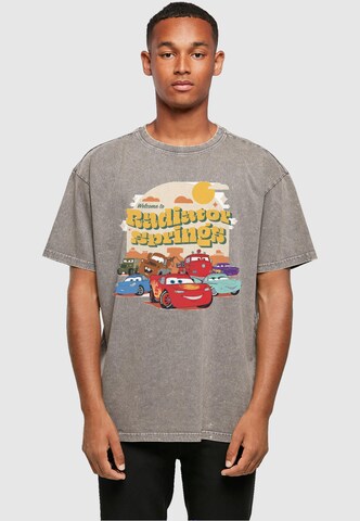 ABSOLUTE CULT Shirt 'Cars - Radiator Springs Group' in Grijs: voorkant