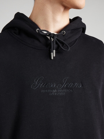 GUESS JEANS Collegepaita värissä musta