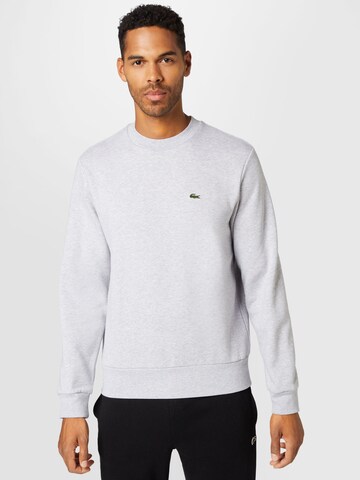 Sweat-shirt LACOSTE en gris : devant