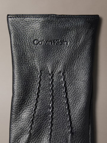 Mezzoguanti di Calvin Klein in nero