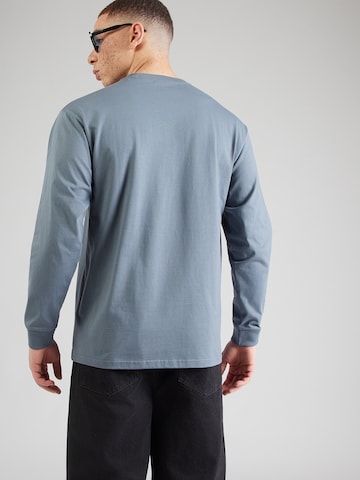 Carhartt WIP Tričko 'Chase' – modrá